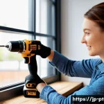 전동 공구 소비자 만족도 조사 - A close-up scene of a woman with small hands comfortably gripping a modern cordless electric drill d...